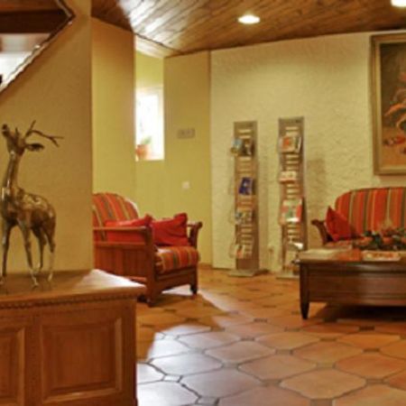 Hostellerie Les Chevreuils Losanna Interno foto